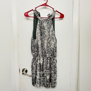 Used, good condition, missing all the buttons in the back